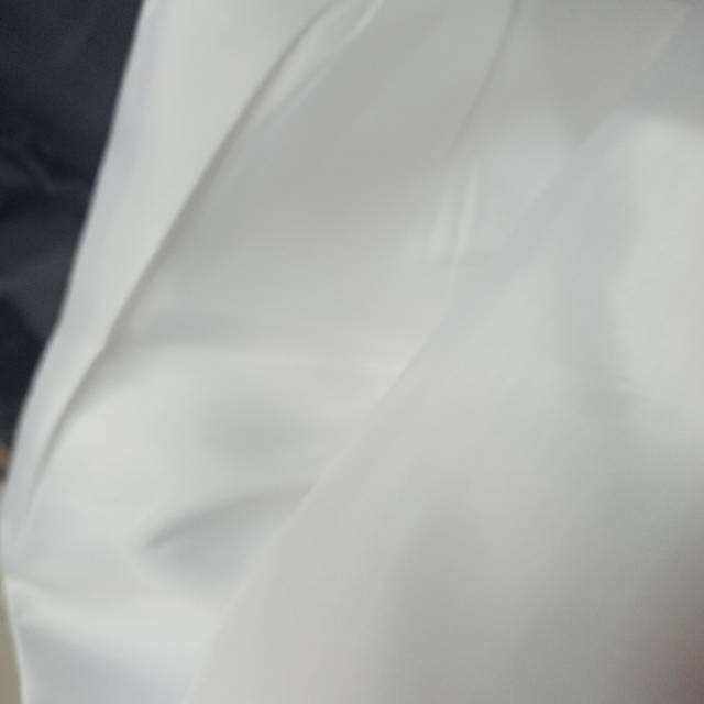 Polyester taeff light white fabric is used for wholesale and retail of clothing, handicrafts and other fabrics. Quality and quantity guaranteed, available in stock. For orders, please consult details Picture