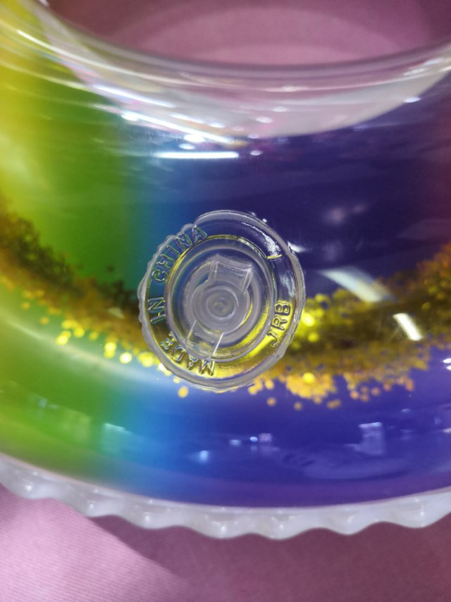 Wholesale of popular PVC inflatable toys, sequined rainbow rings and swimming rings from manufacturers Specification image