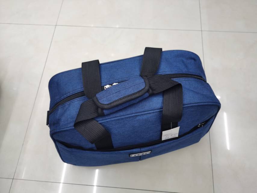 蓝色简约多功能大容量帆布行李袋产品图