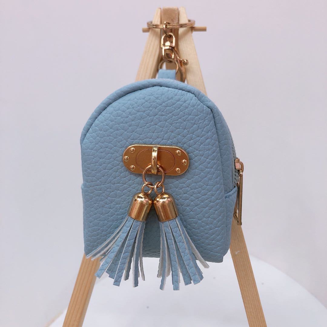 Fringed leather College style mini zero purse