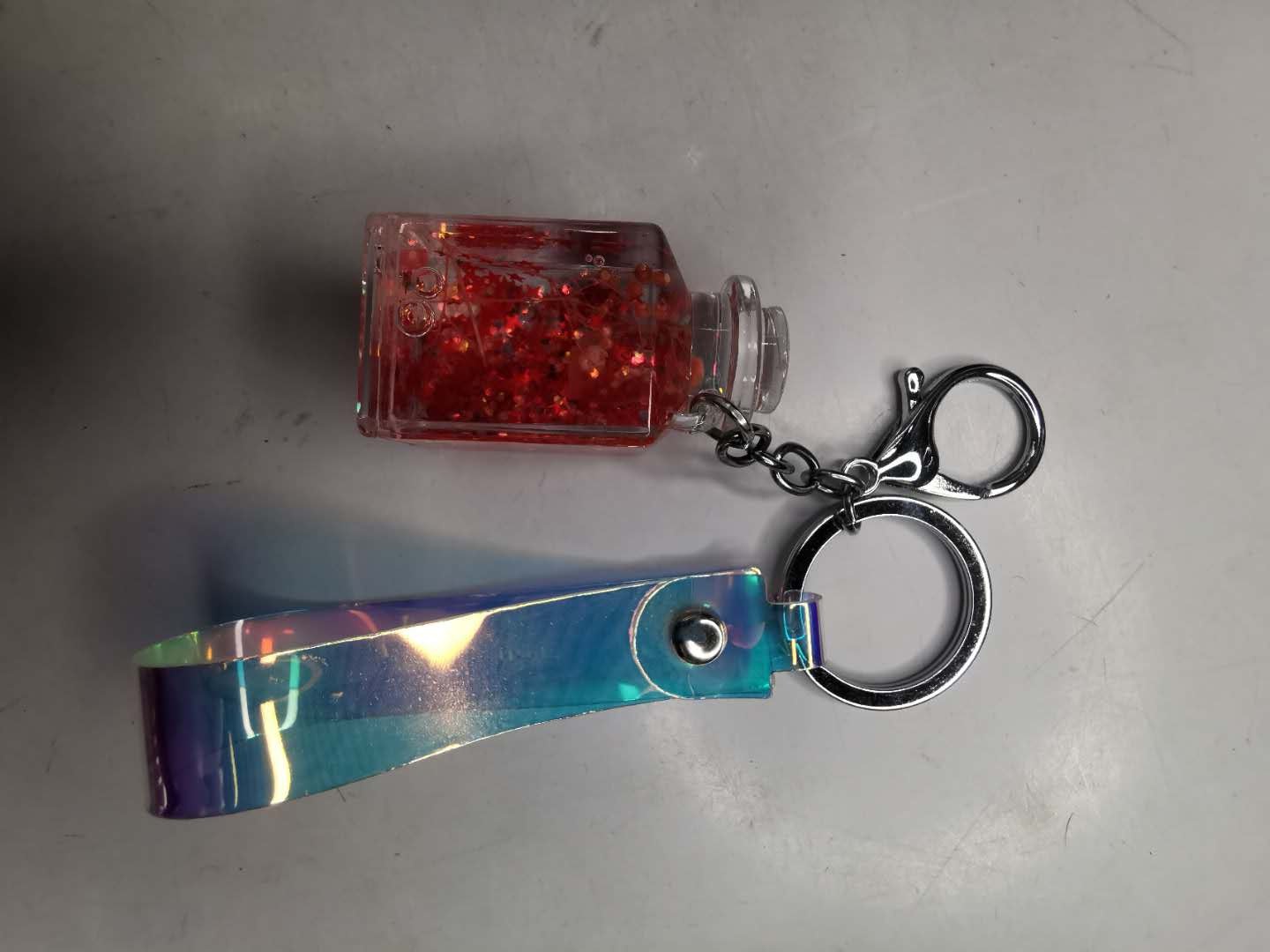 Internet celebrity unicorn floating cream bottle key chain personality creative crystal dried flower quicksand liquid key chain