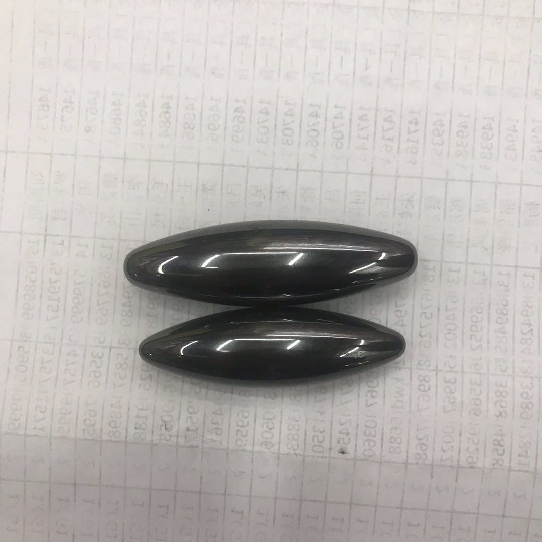 大号磁性橄榄球磁铁玩具磁石黑胆石吸铁石一对