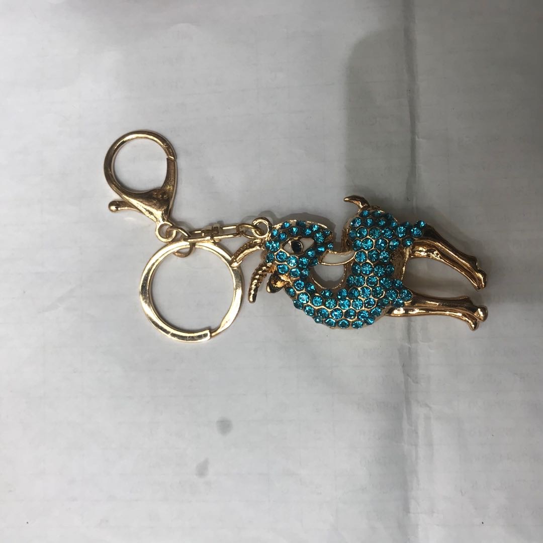 The keychain features a cute deer design with a cold and high-end vibe from Internet celebrities