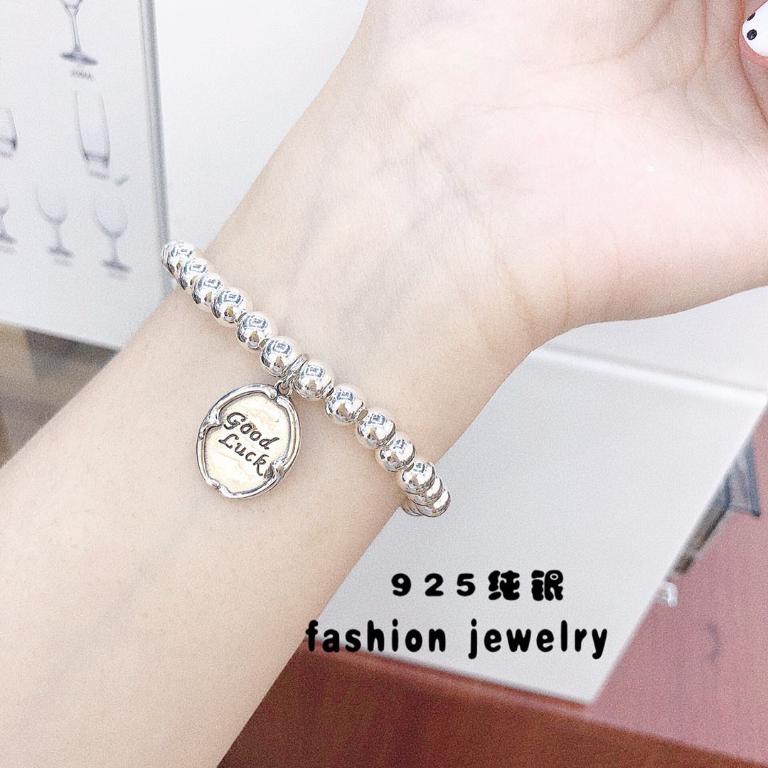 Fashionable design engraved round-row pendant, pure silver bracelet, fashionable, individual, high-end and elegant, popular women's jewelry