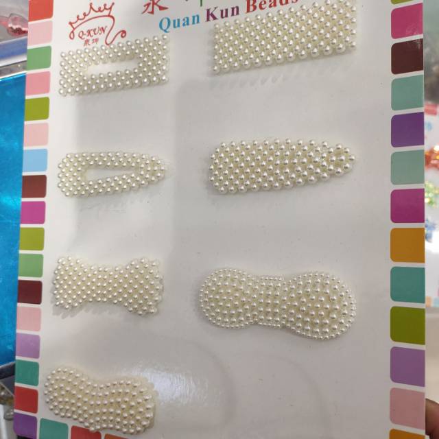 White pearl hair clip accessory Specification image