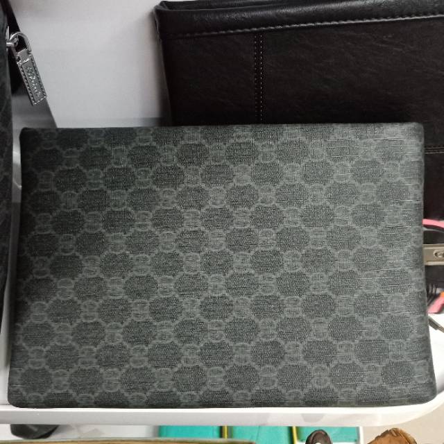 男生菱形格纹手提包黑色商务包