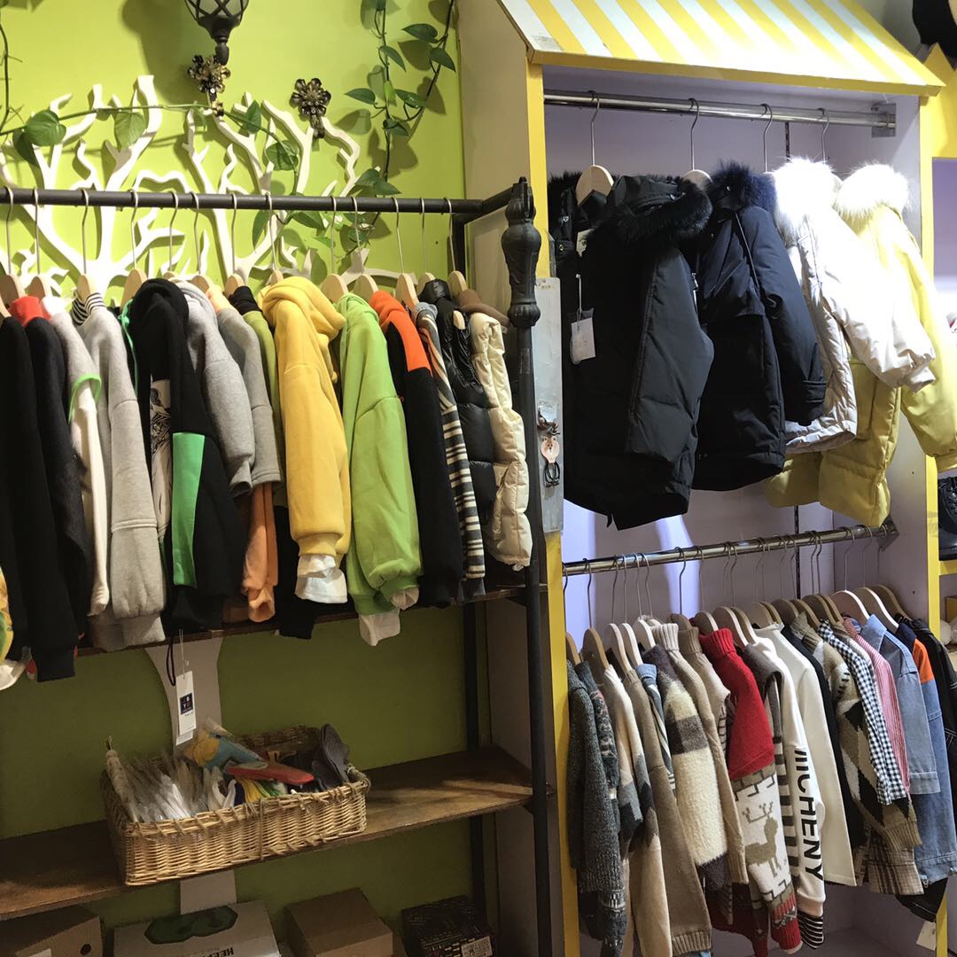 Famous stores on both sides describe pic - 1