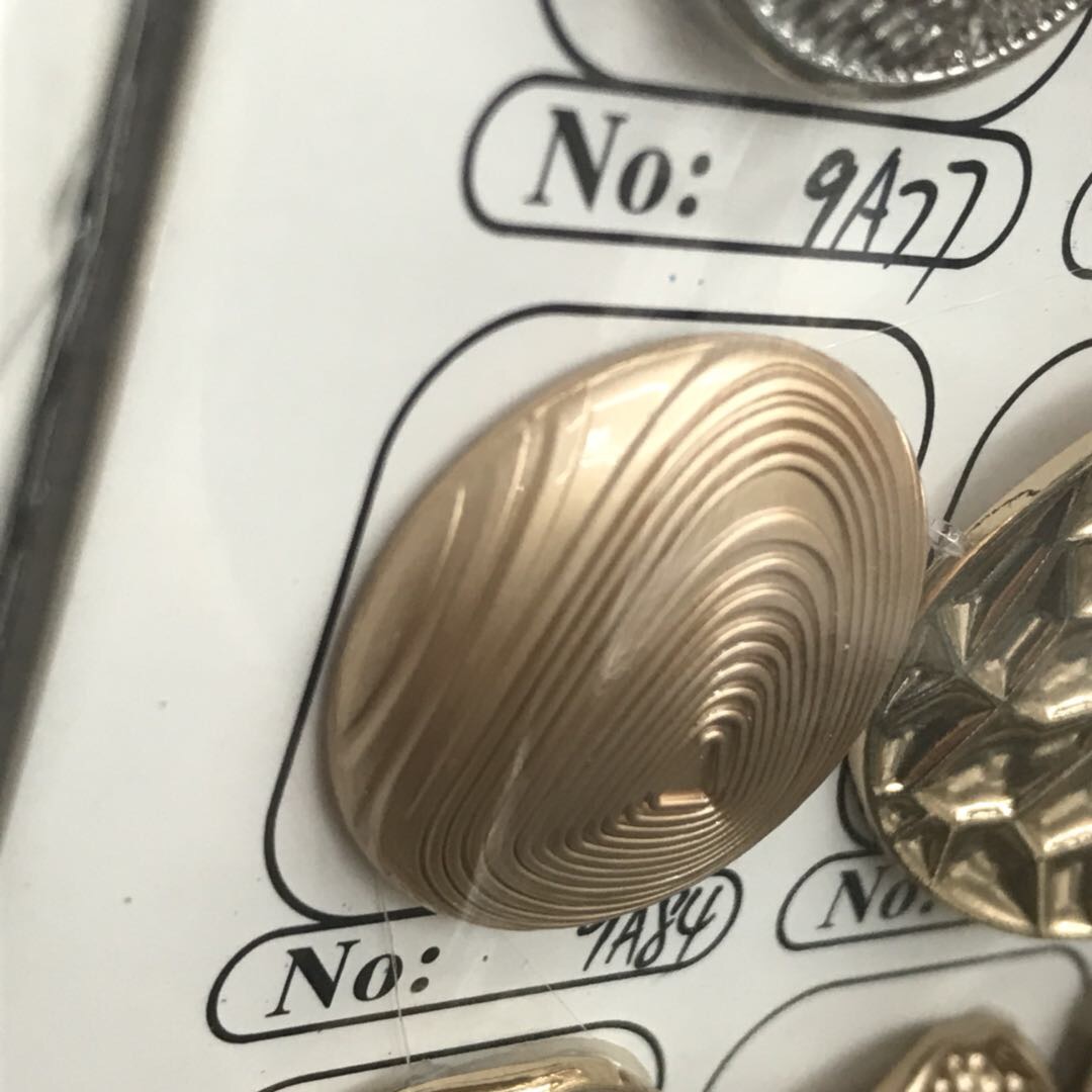 贝壳纽扣/奔涵盘扣/鞋扣/铁环/心型纽扣细节图