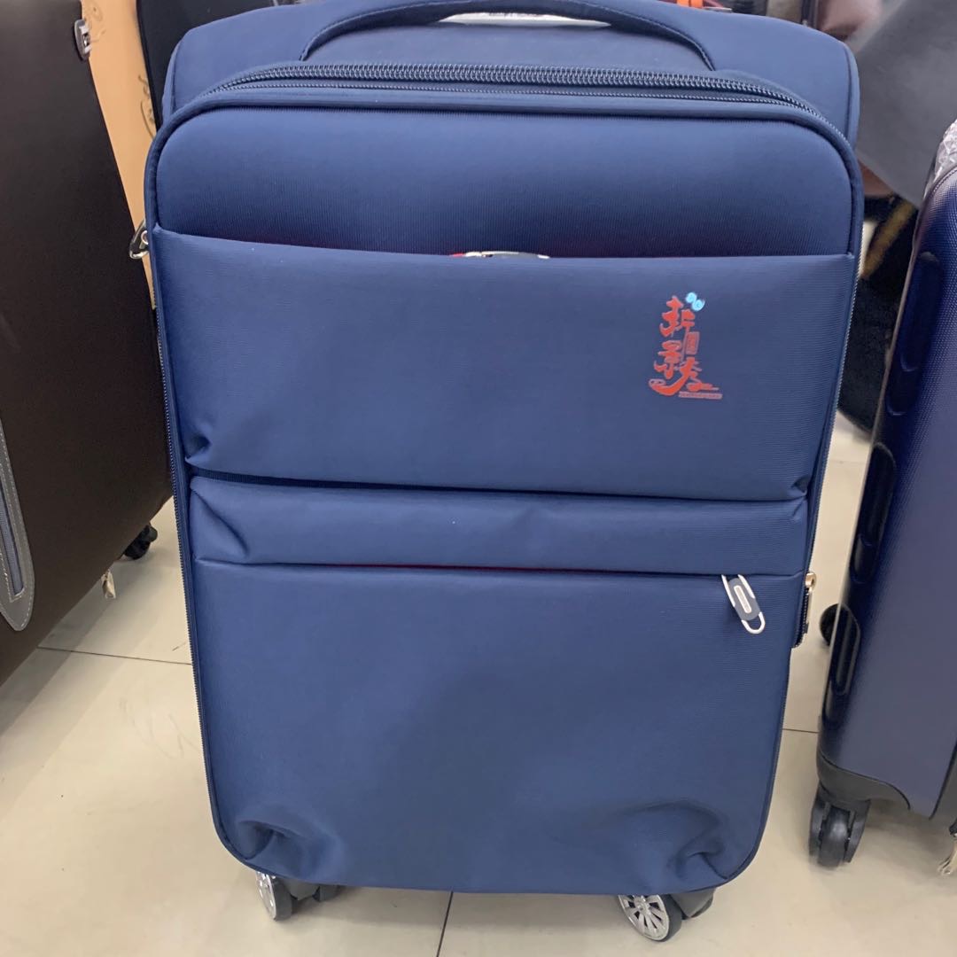 蓝色牛津布行李箱侧面密码旅行拉杆箱男万向轮