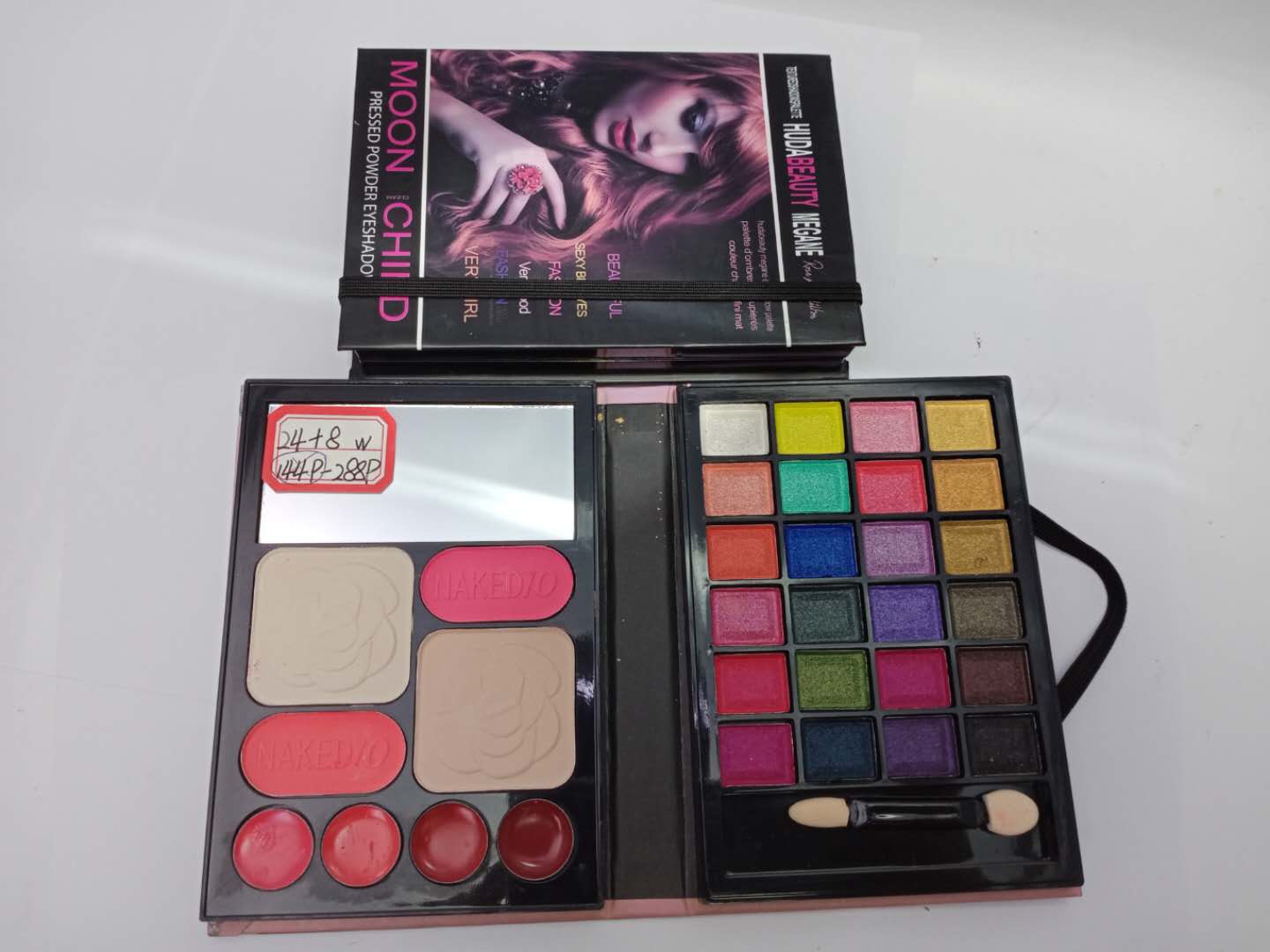 Waterproof, sweat-proof and non-smudging 24+8 color eyeshadow powder compact lip gloss set