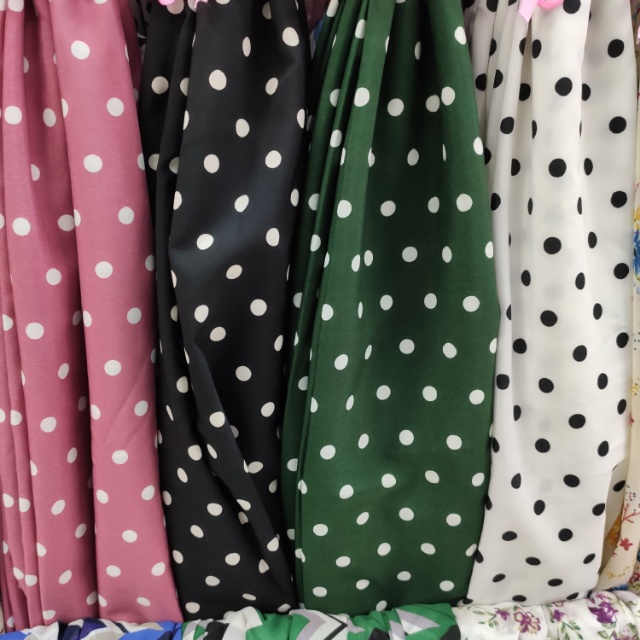 Polka dot encrypted four-sided elastic clothing decorative fabric available in multiple colors. Price negotiable