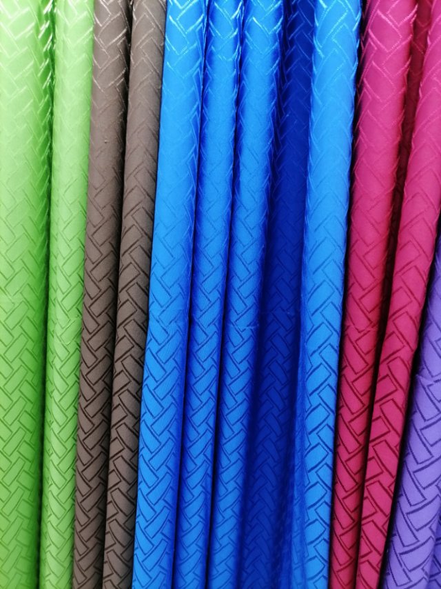 Jacquard curtain fabric in solid color, simple style, custom heat insulation and sunshade for living room, rented bedroom details Picture