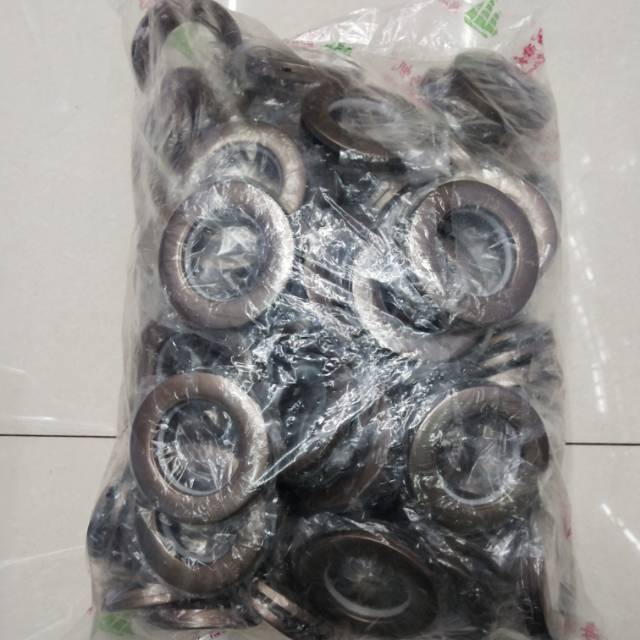 Nanocoil curtain rings in soft daylight showing sleek metallic finish
