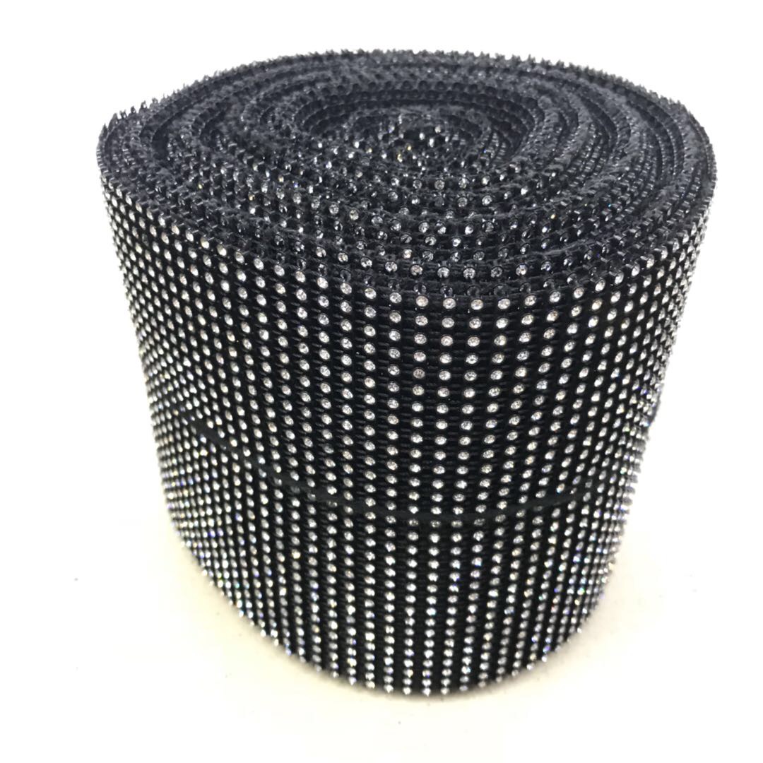 The black base of the dress is decorated with small silver rhinestones Specification image