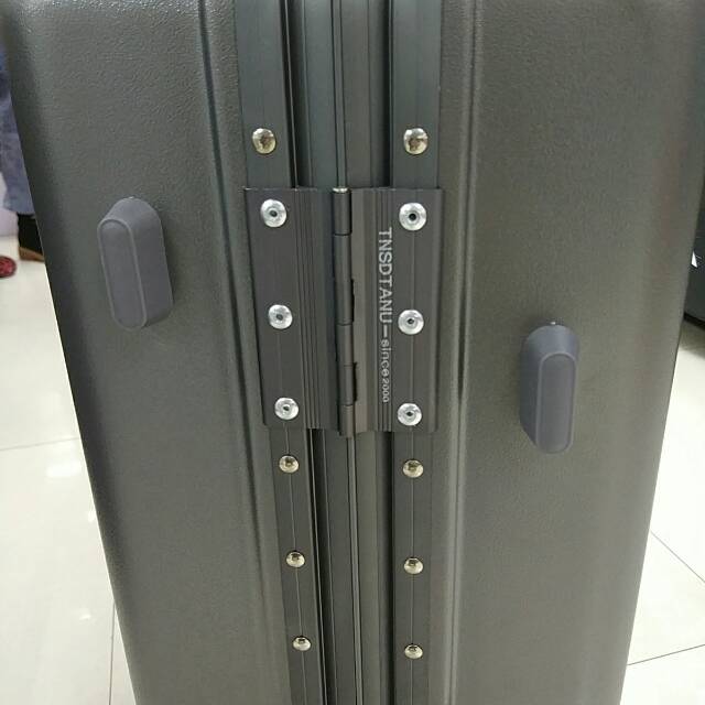 Close-up of universal wheels on luggage rotating smoothly