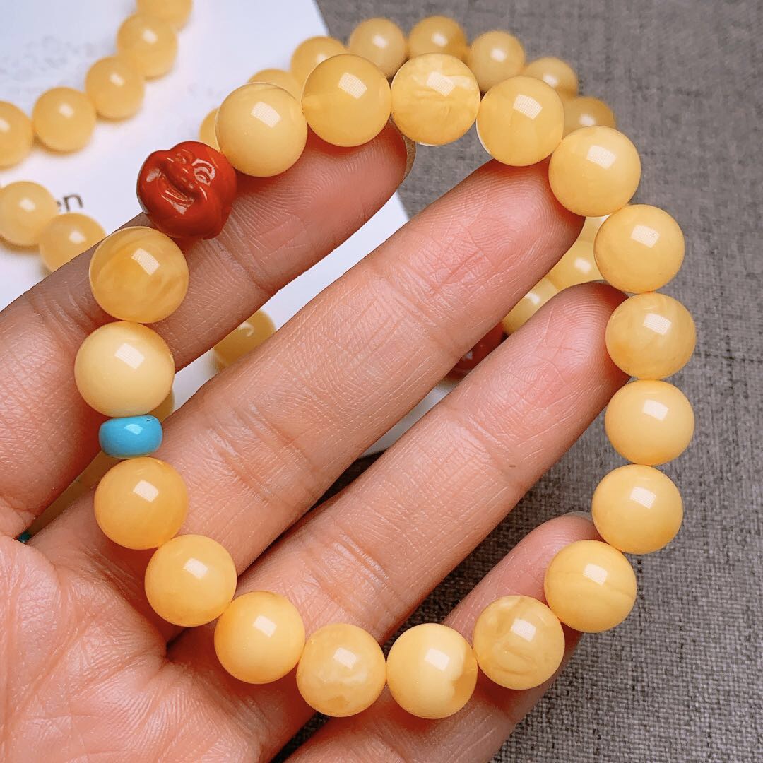 The beeswax suite-shaped bracelet has plump grains and rich wax texture. Xiangyu 0002 details Picture