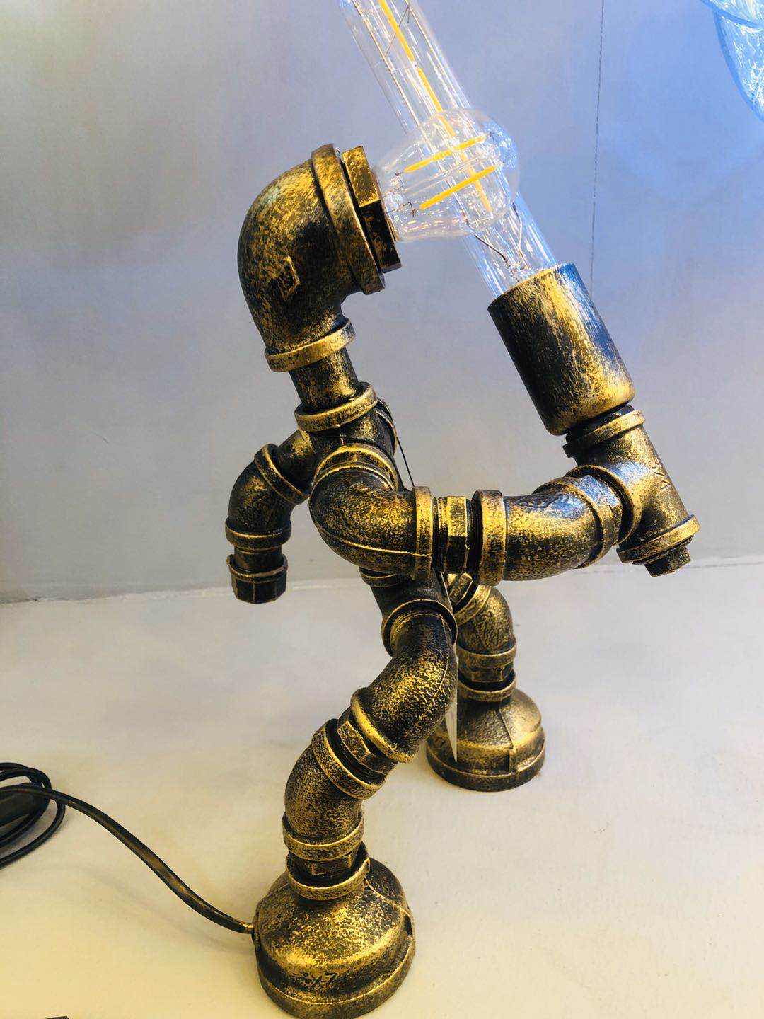 Industrial-style table lamp, personalized and creative decoration, coffee shop and bar table lamp, led retro and creative robot water pipe table lamp details Picture
