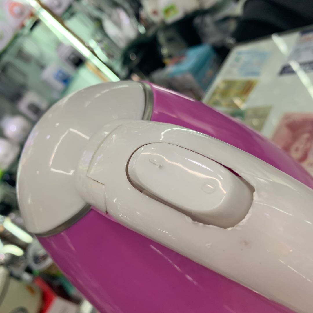 A pinkish-white water kettle for household use Specification image