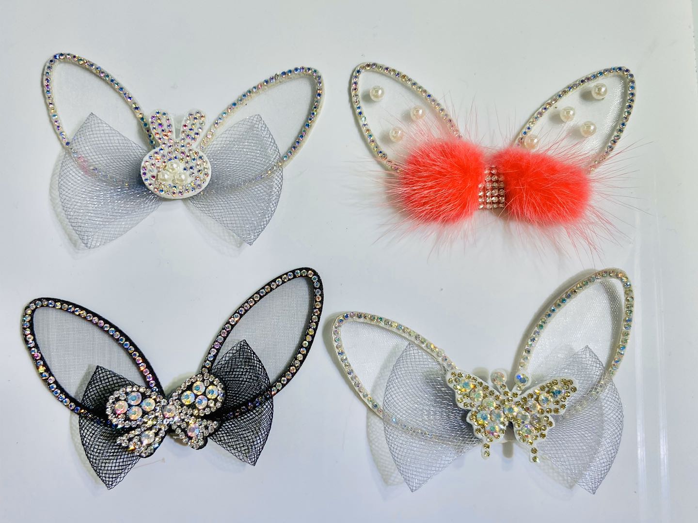 Rabbit ear bow graphic accessories displayed on pastel background