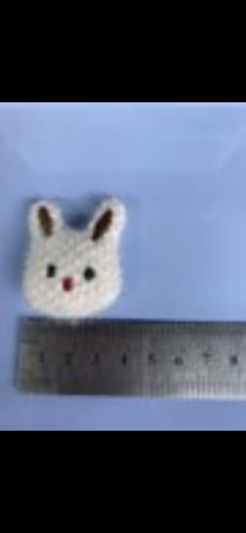 手工缝制绒布小白兔发饰服饰帽等工艺装饰配件产品图