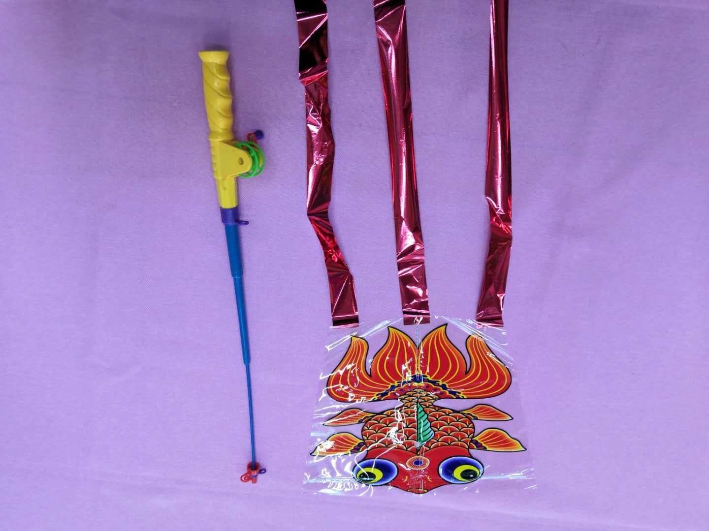 Wholesale 30cm fishing kite children's cartoon Easy flying kite toy manufacturer (starting from 600 batches)