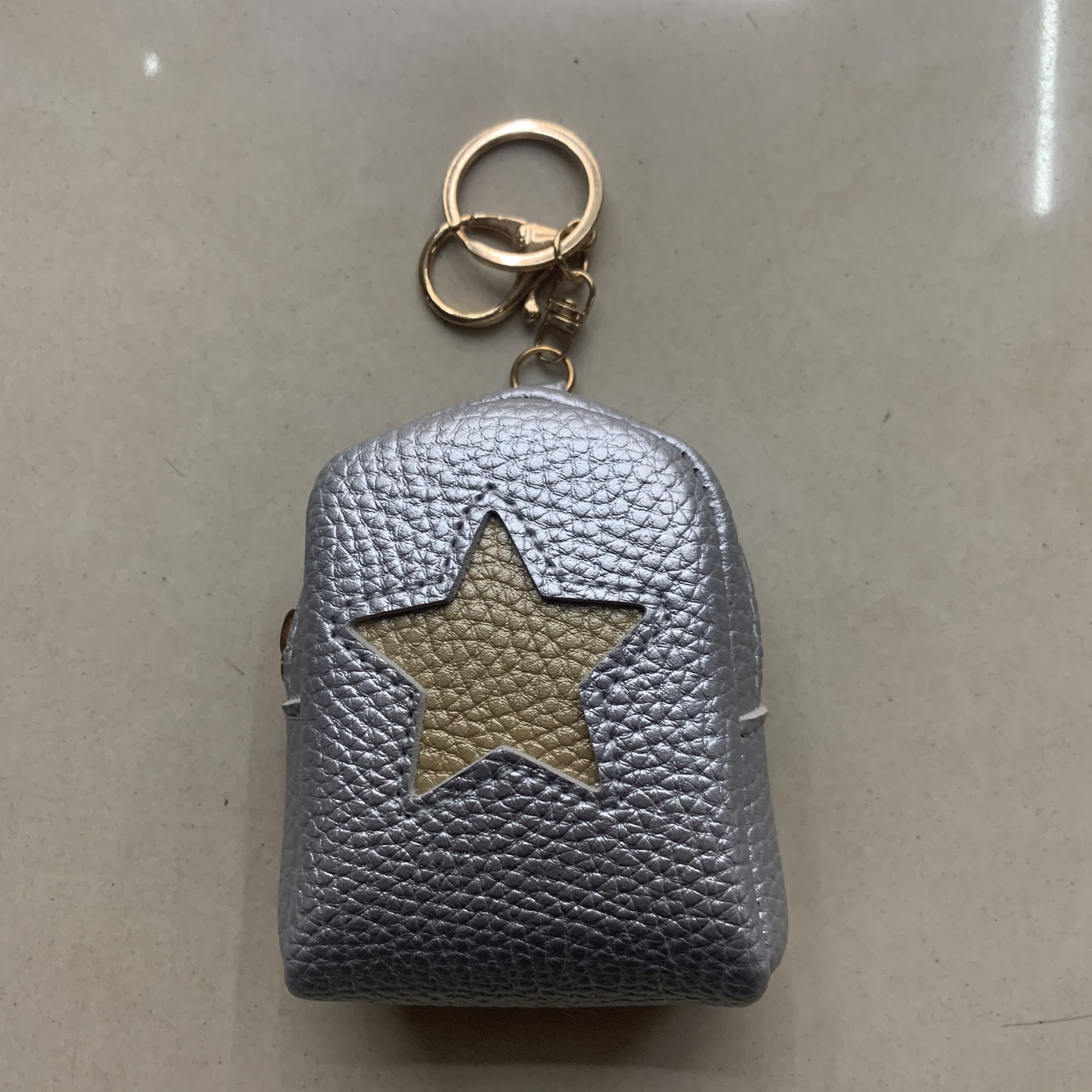 星星迷你卡通零钱包儿童创意小钱包耳机数据线收纳包新款