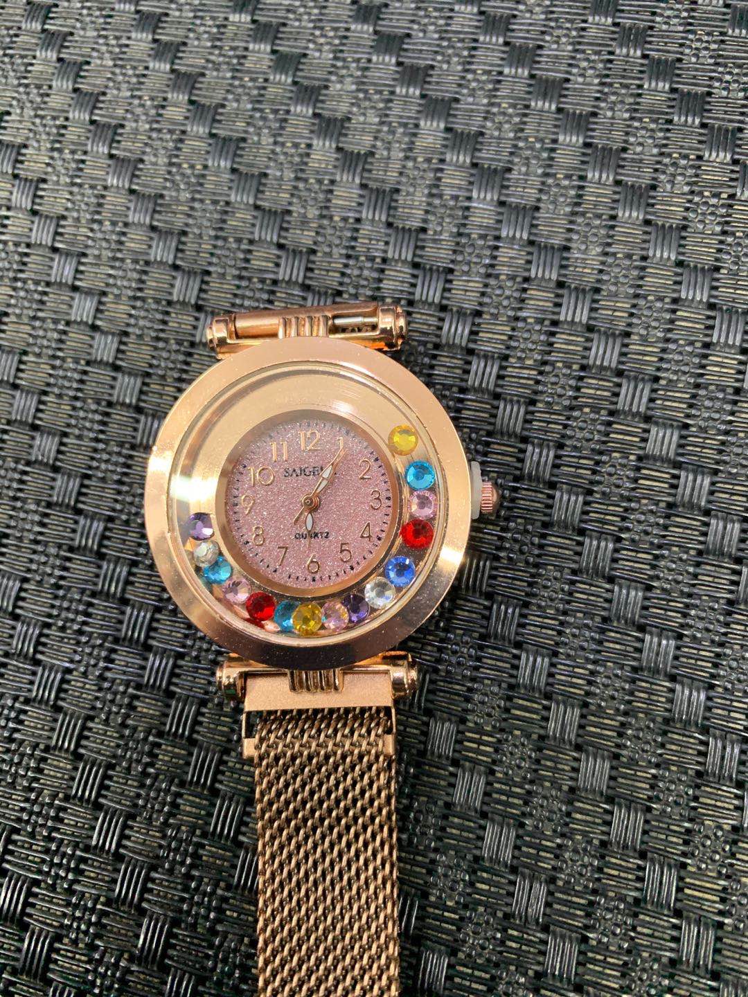A fashionable ultra-thin ladies' watch with a colored sand and rhinestone strap Specification image