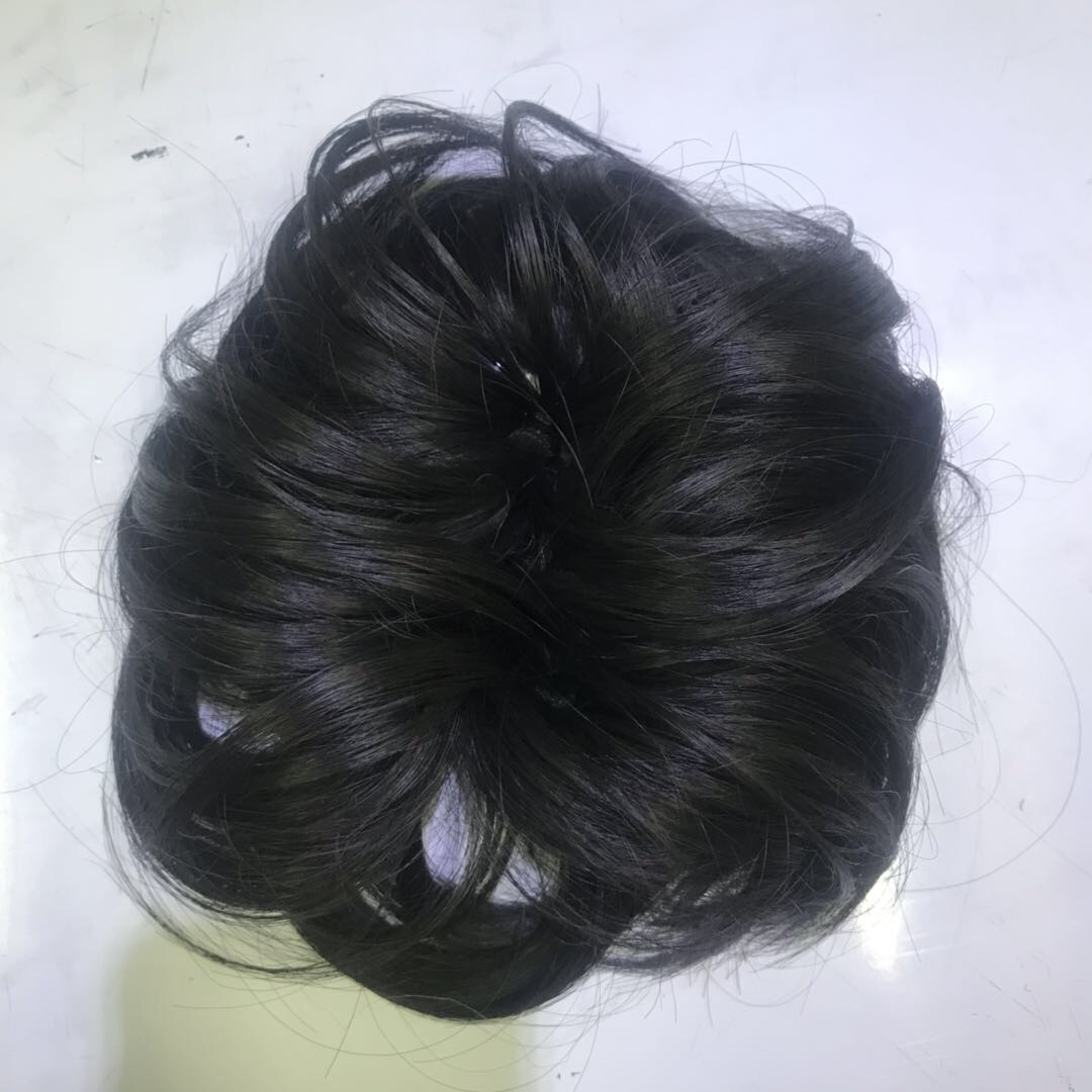 A popular and fashionable black clipped ponytail wig made of chemical fiber for export