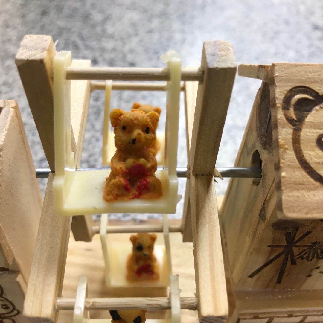 miss you, a family of wooden little squirrels, a large waterwheel with a house and a pen holder details Picture