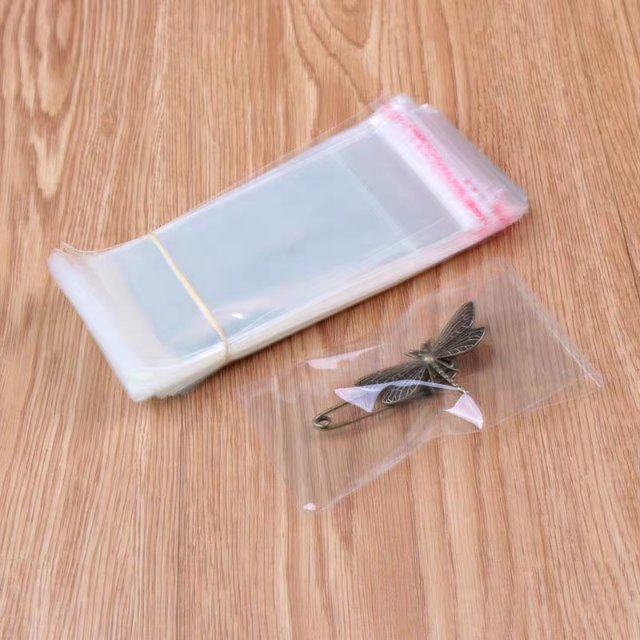 以勒OPP袋现货笔袋玩具包装化妆品包装袋200个透明自粘袋7x34cm定制细节图