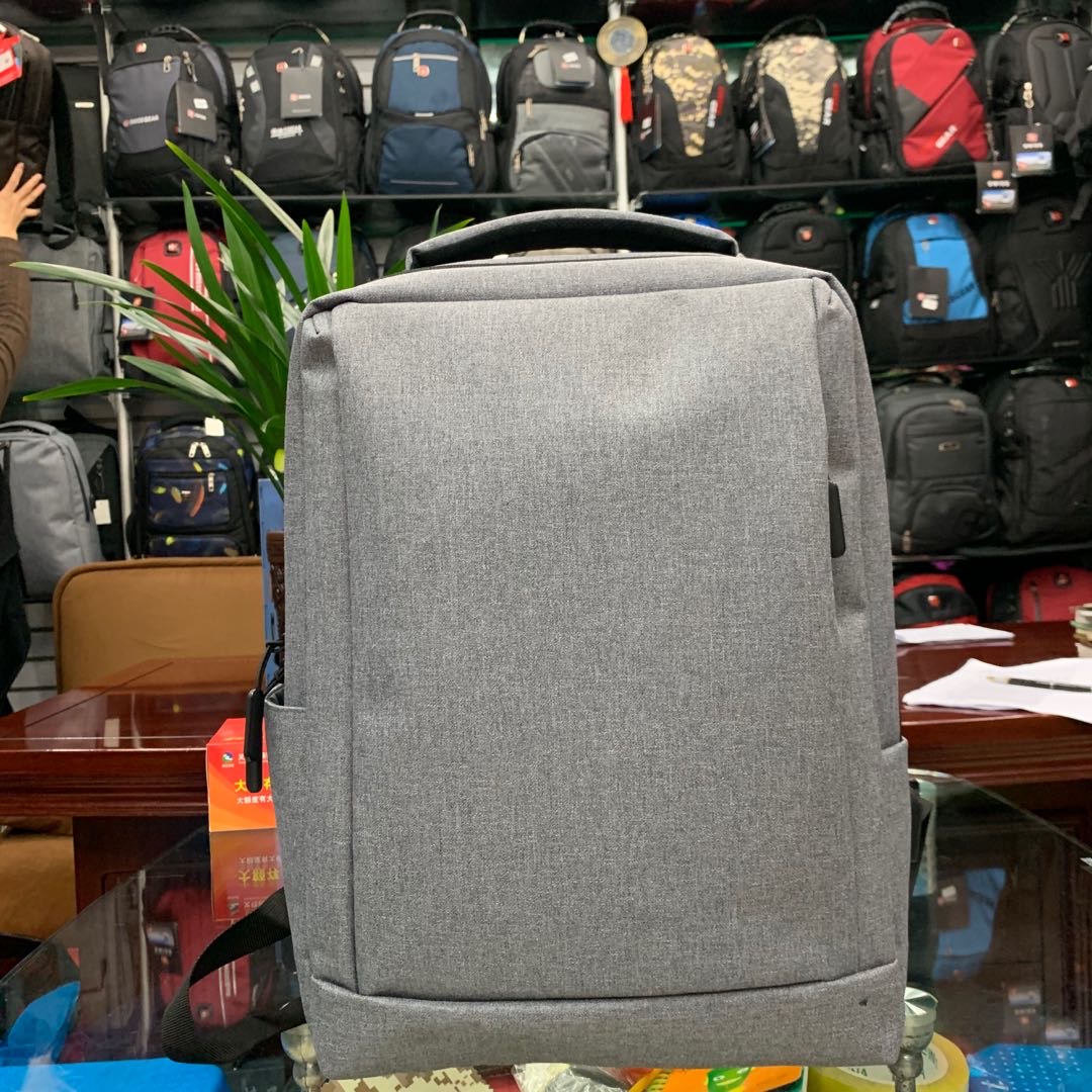 厂家直销新款帆布双肩包背包灰色男