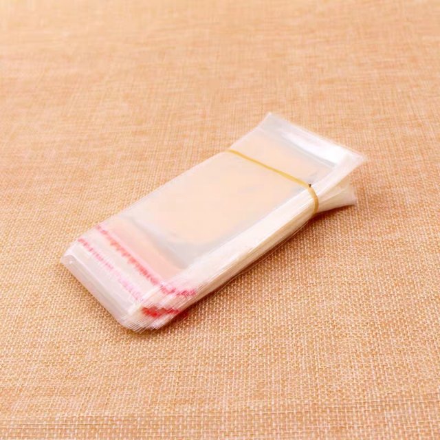 以勒OPP袋现货笔袋玩具包装化妆品包装袋200个透明自粘袋7x34cm定制产品图