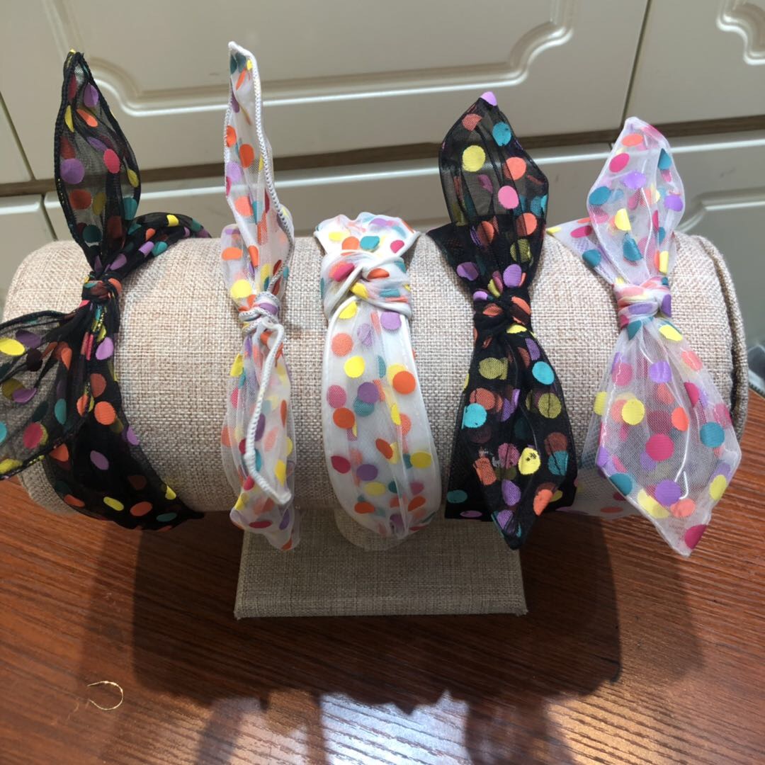 Full image of model wearing mesh lace headdress