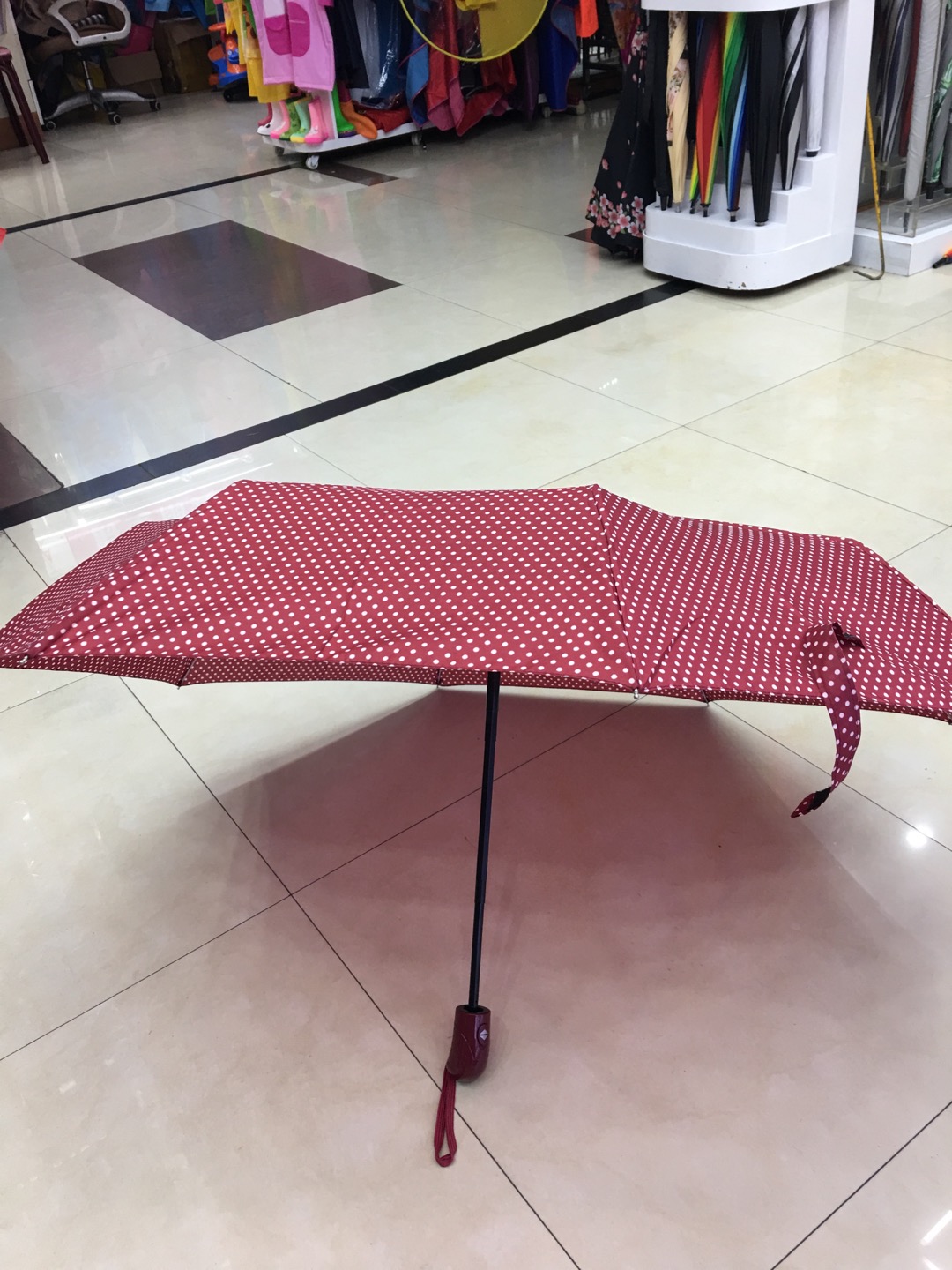 8开全自动折叠伞点点图案简约防风产品图