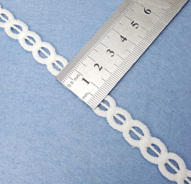 Hot-selling in-stock white hollowed-out, non-elastic small lace trim, milk silk water-soluble embroidered barcode accessories for clothing