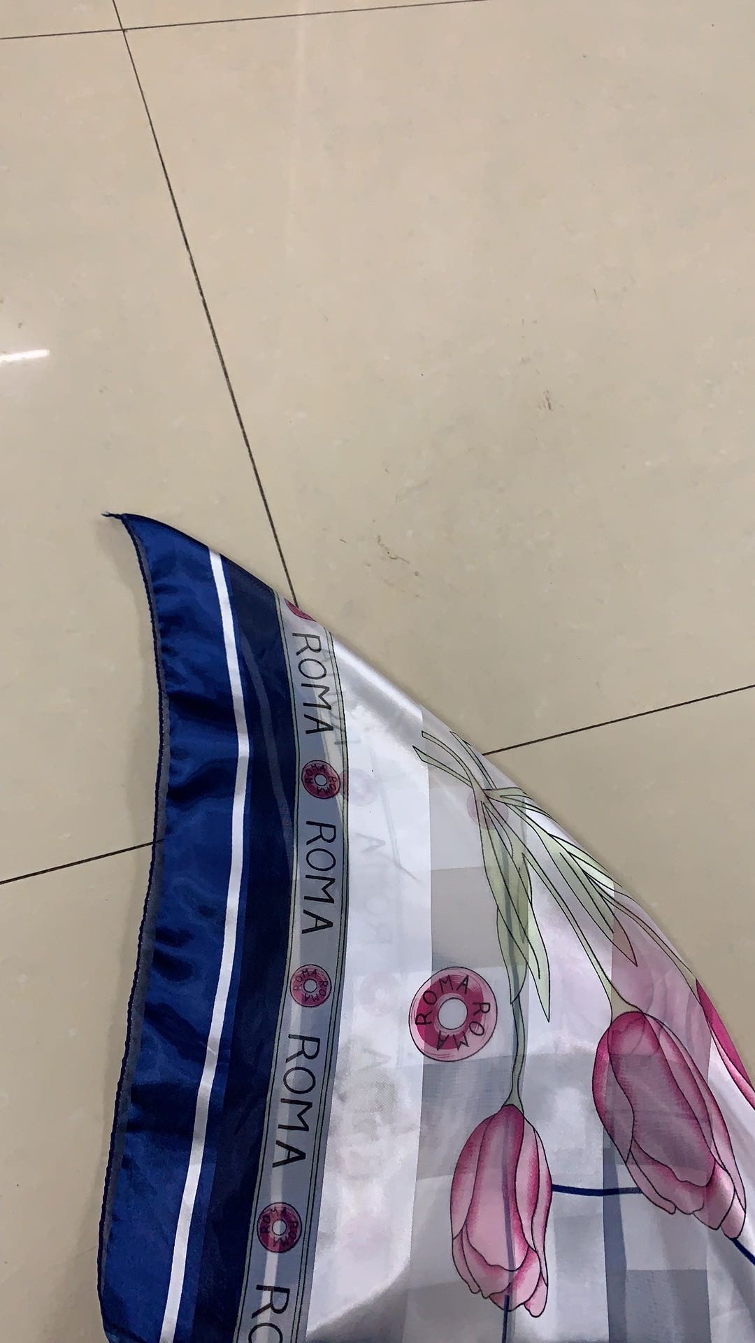 Assorted colorful scarves displayed in artistic arrangement