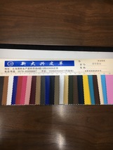 厂家直销 20年新款 荔枝纹 pu箱包材料 装饰革节转印革