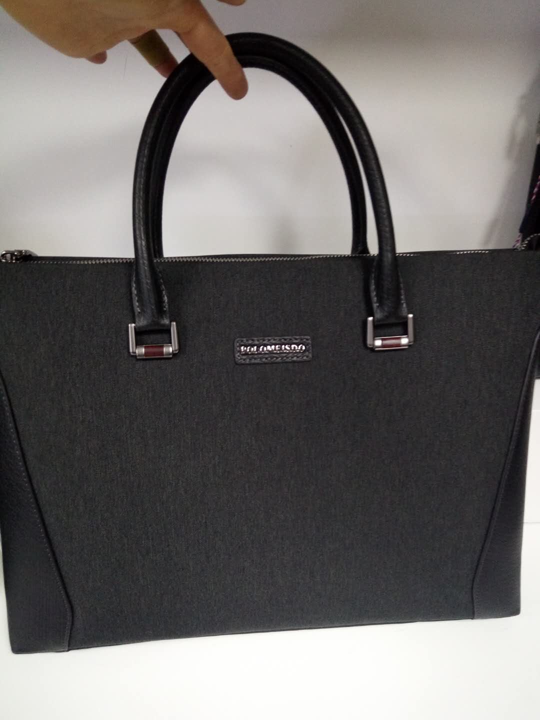 保罗公文包牛津布配头层牛皮公文包图