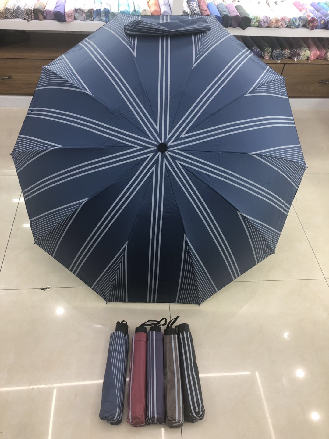 Tri-Fold Umbrella With Vinyl Stripes details Picture