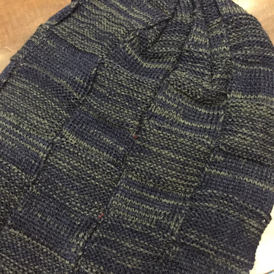 Close-up of textured knit pattern on maternity wool hat
