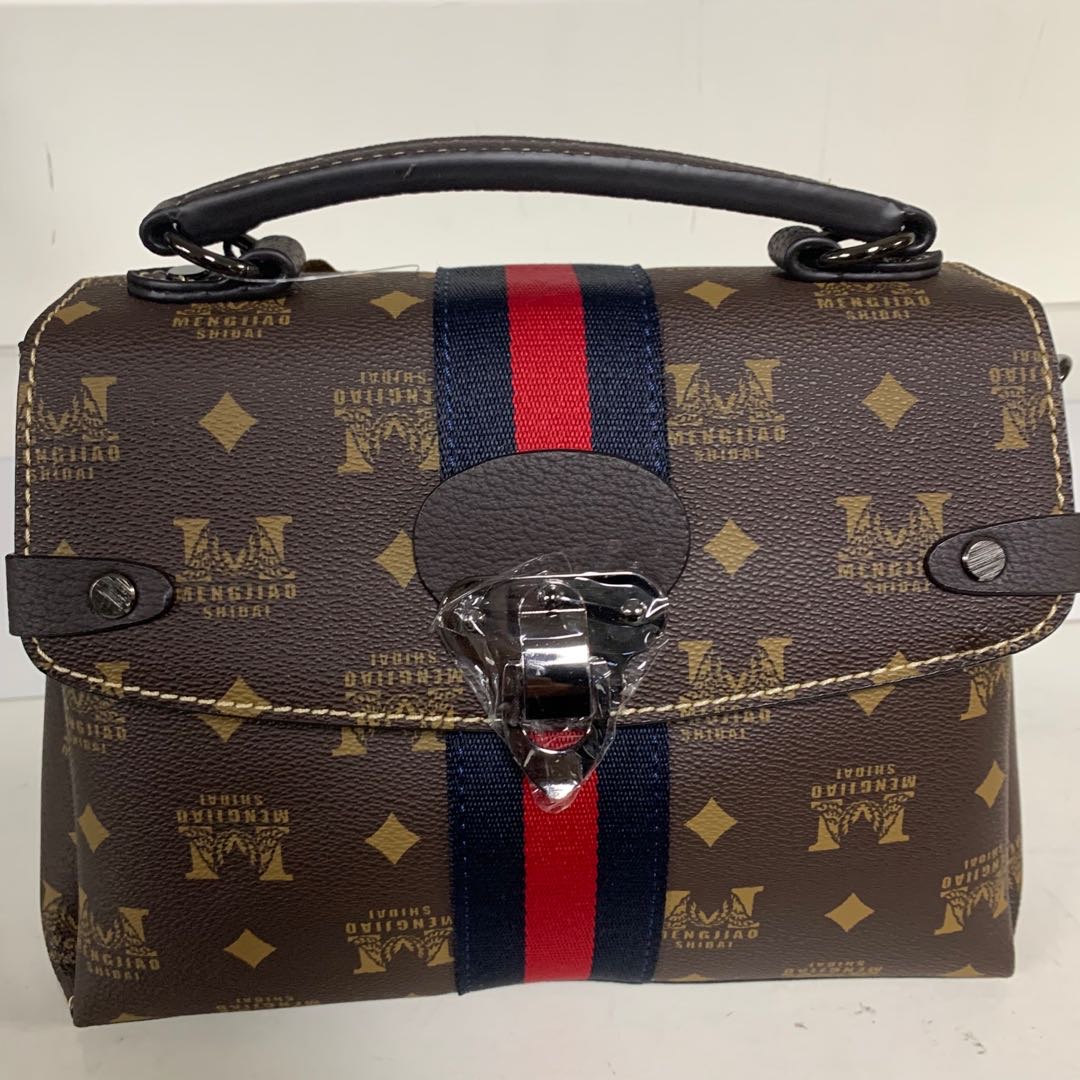 Lady's fashion bag with elephant stripe and cowhide top coat thumbnail