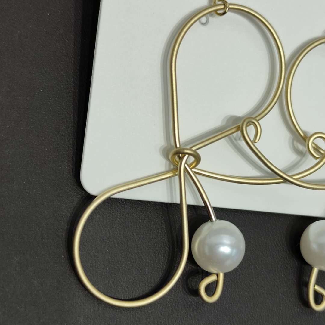 新款时尚气质蝴蝶结镶珍珠耳环气质耳环产品图