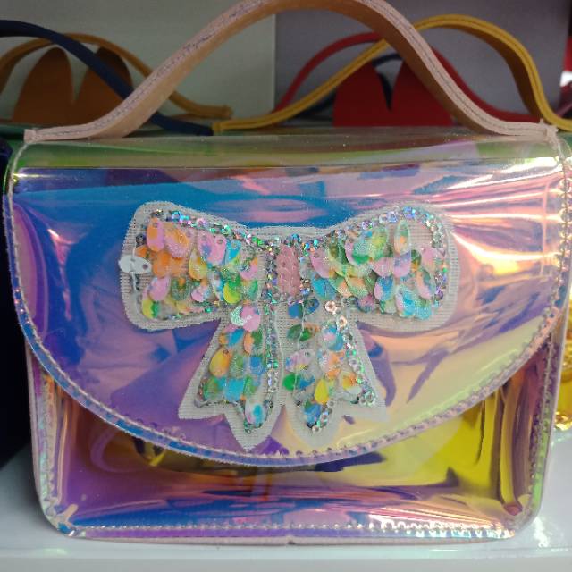 女生蝴蝶结反光零钱包按扣图