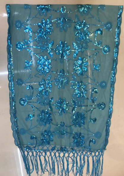 A versatile and fashionable women's headscarf with tassels, sequins and embroidered patterns