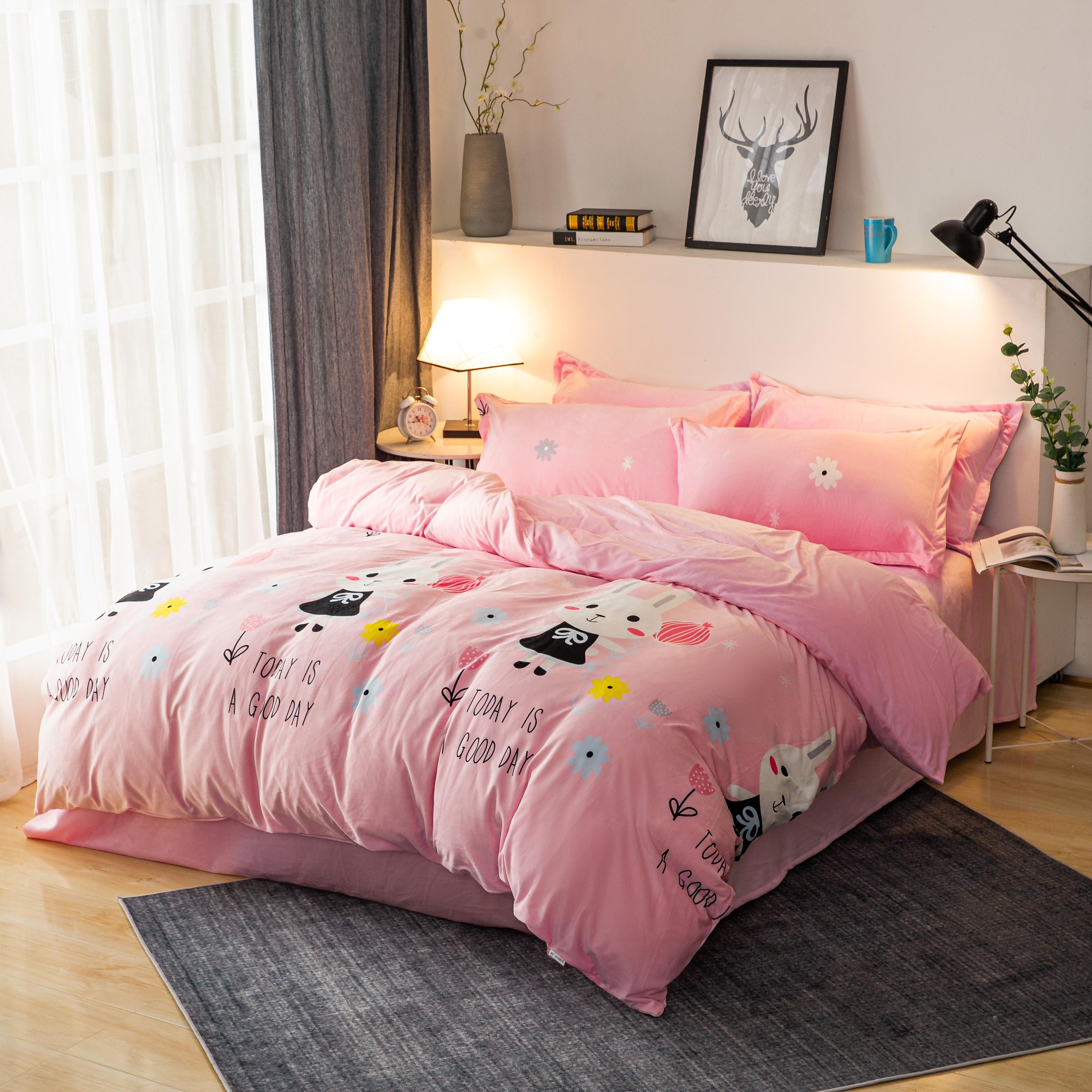 Lomeng Rabbit Pink Double-Sided Coral Velvet Flannel Set on a modern bed