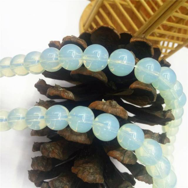 Guangshun Jewelry's Opal DIY White cat's Eye round bead jewelry and pearl matching factory Direct sales details Picture