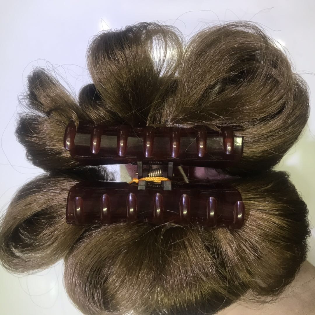 A synthetic fiber flower-shaped wig with a clipped ponytail accessory for ladies Specification image