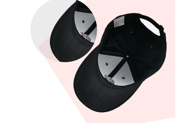 Person wearing the panda cap in casual urban setting