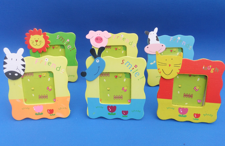 A corner of a children's room with wooden cartoon frames