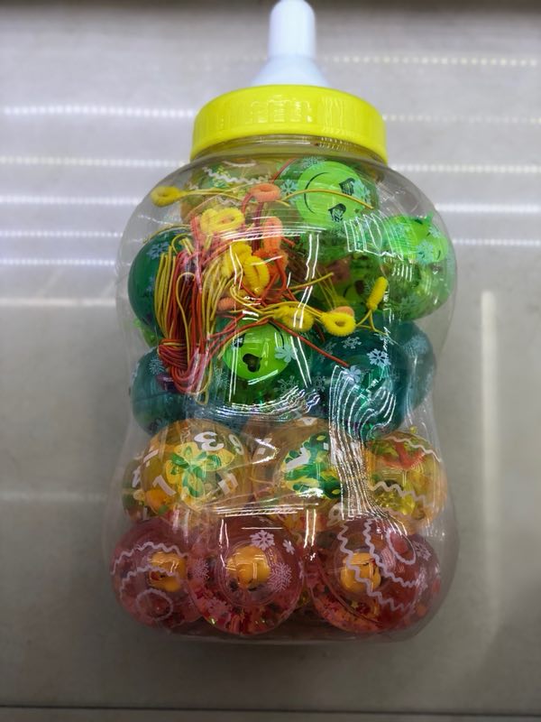 奶瓶装6.5cm发光弹力球带绳款TPU材质儿童玩具